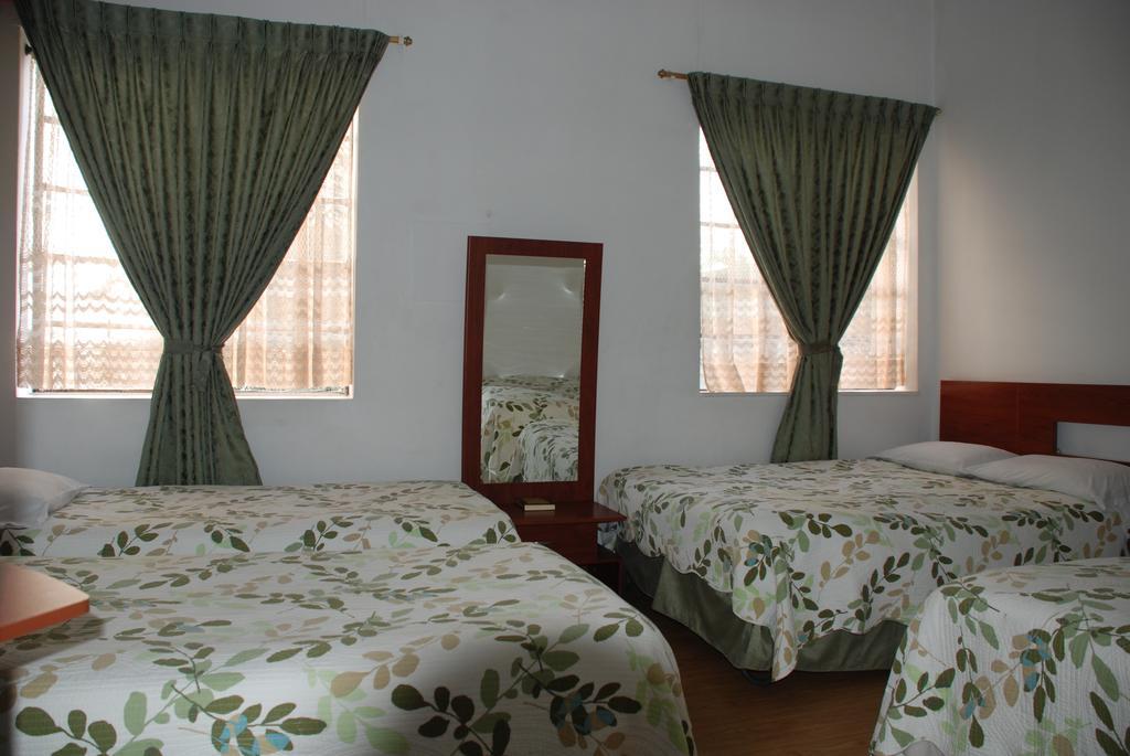 Hotel Bella Montana Манисалес Номер фото